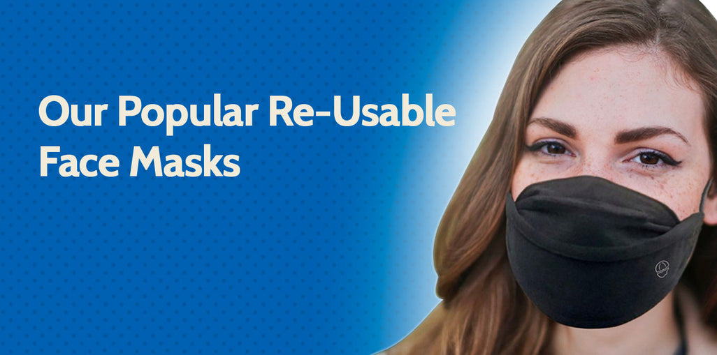A woman with a black face mask is smiling slightly against a blue background. Text reads, Our Popular Re-Usable Face Masks.