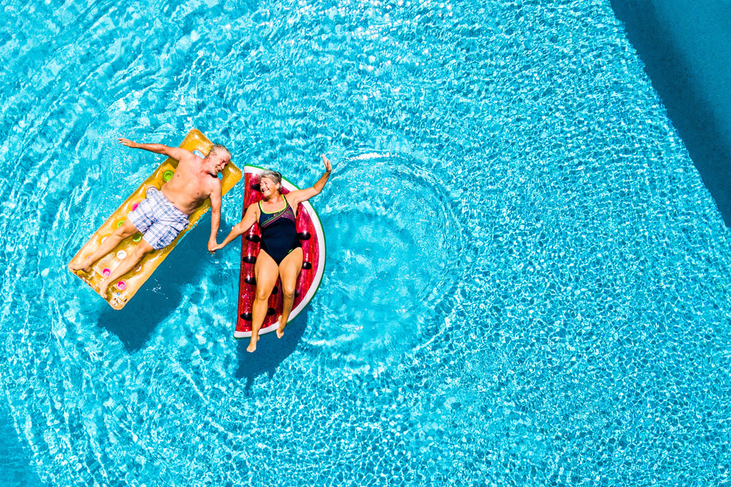 Elderly couple in the pool