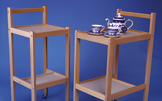 A serene beach with a golden sunset, gentle waves lapping the shore, and a lone seagull soaring in the sky.