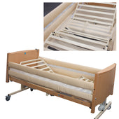 Sidhil Bradshaw Mesh Cradle with adjustable profiling, beige padded rails, and wooden head and footboards, side view.