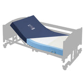 Bariatric adjustable bed with blue and white foam mattress on grey frame, partially raised side view.