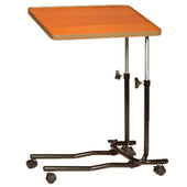 Drive overbed table with light brown top, black metal frame and four castors, adjustable height, front angle view.
