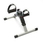 Digital pedal exerciser with adjustable foot straps, resistance knob and built-in display, front view.