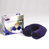 Dark blue U-shaped travel pillow next to its box, woman wearing the pillow around her neck, in use view.