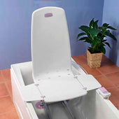 White Mangar Archimedes bath lift chair in a bathtub near a potted plant on tiled floor, side view.