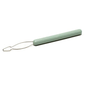 Green-handled metal buttoning tool with looped tip for dressing tasks, Etac Butler Buttoner Long, side view.