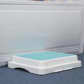 Savanah Bath Step with light blue top on blue carpet, white radiator behind, front view.
