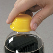 Dycem bottle opener twisting open a plastic soda bottle cap, in use.