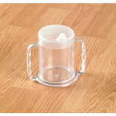 Transparent mug with two handles and a white lid on a wooden surface, front view.