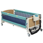 Hospital bed with mesh side rails, blue padding, wheels and control panel for adjustments, side view.