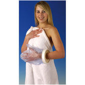 Woman in a towel wearing a waterproof hand and forearm cast protector, blue background, front view.