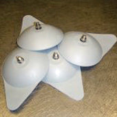 Three white dome-shaped Neptune Bath Lift suckers with metal screws, shown as replacement parts, close-up view.