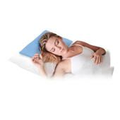 Woman lying on her side using a Lifemax Cool Pad Pillow under a white blanket, in use.