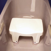 White plastic bath seat with armrests and suction pads, positioned inside a bathtub, side view.