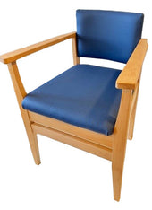 Navy commode with armrests and padded blue seat on a hardwood frame, front view.