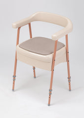 Ashby commode chair in oatmeal with armrests, padded seat, and tubular steel frame on white background, front view.