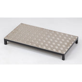 Rectangular steel and aluminium half step with diamond plate surface and four adjustable nylon feet, front view.