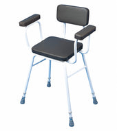 Perching stool with padded arms, backrest, and black cushioned seat on a white metal frame with rubber feet, front angle view.