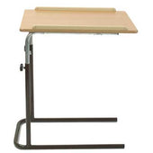Cream overbed table with wooden surface, metal frame, and manual height adjustment, shown from a side angle.