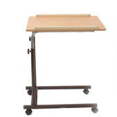 Cream overbed table with wooden top, metal frame and castor wheels, adjustable height, side angle view.