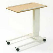 Overbed table with adjustable height, spring mechanism, light wood top and white frame, side view.