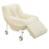Sidhil CQR Mobile Chair with cream upholstery, reclining back and four caster wheels, side view.