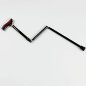 Black coloured folding walking stick with zig-zag pattern and dark red handle, shown on a light background, front view.