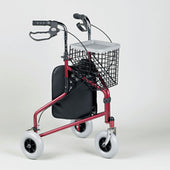 Three-wheeled rollator in ruby with black seat, wire basket, and adjustable handles, front view.