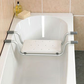 White suspended bath seat with handles and tray for bath items, resting across a bathtub, front view.