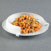 Homecraft Incurve Plate Surround fitted on plate with pasta and tomato sauce, aids one-handed eating, grey surface, top view.