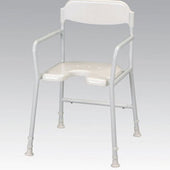 White shower chair with armrests, cut-out seat, rubber-tipped legs and backrest, front angle view.