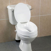 Homecraft Savanah raised toilet seat with lid fitted on a white toilet in a tiled bathroom, angled view.