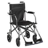 Foldable black aluminium transport chair with armrests, footrests and four wheels, for occasional use, side view.
