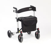 Drive X-Fold Rollator with black seat, storage bag, and hand brakes on a white background, front view.