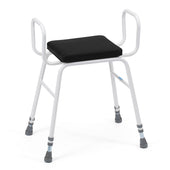 Perching stool with steel arms, black foam seat, and non-slip rubber tips, front view.