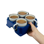 Light grey recycled plastic muggi tray carrying four white mugs with drinks, shown held in one hand, in use view.