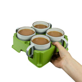 Light grey Muggi tray made from recycled plastic, held in one hand and carrying four mugs, white background, in use.