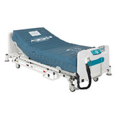 Sidhil Apollo 2 Dynamic Mattress for hospital beds with adjustable settings and controls, shown in use on bed frame, angled view.