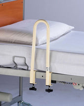 Drive Casa Bed Loop fixed to bed side beside white pillow and tidy bedding, shown in use side view.