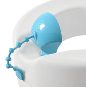 Blue Gordon Ellis Derby P-Guard urine deflector fitted to a white potty training seat, close-up view.