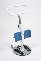 Drive Ablestand Patient Turner with blue knee supports, white handlebar, wheels, and round grey base, front angle view.