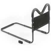 Drive Comfort M Bed Rail with adjustable frame, mesh pouch and safety strap shown attached to bed, side view.