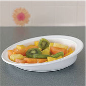 Drive Scoop Dish holding sliced fruit on a non-slip grey countertop, top view.