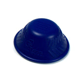 Blue silicone dome-shaped bottle opener with ridged grip and Tenura logo and website embossed, top view.