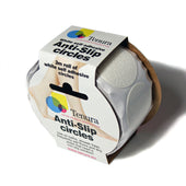 White Tenura bath safety strips and discs, non-slip adhesive for use in baths or showers, top view.
