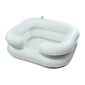 Inflatable hair wash basin, latex free with raised sides and open neck, for use in bed, front angle view.