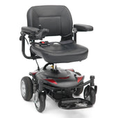 Red Drive Titan LTE Powerchair with armrests, padded seat, footplate and control panel on white background, front angle.