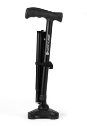 Black Drive Hurrycane walking stick with triple-foot base standing upright on a plain white background, front view.