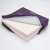 Drive Memaflex Cushion with layered visco-elastic foam and a purple zippered cover, close-up view.