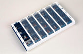 Blue Pivotell large pill organiser with seven daily sections, each with four slots, shown from above.